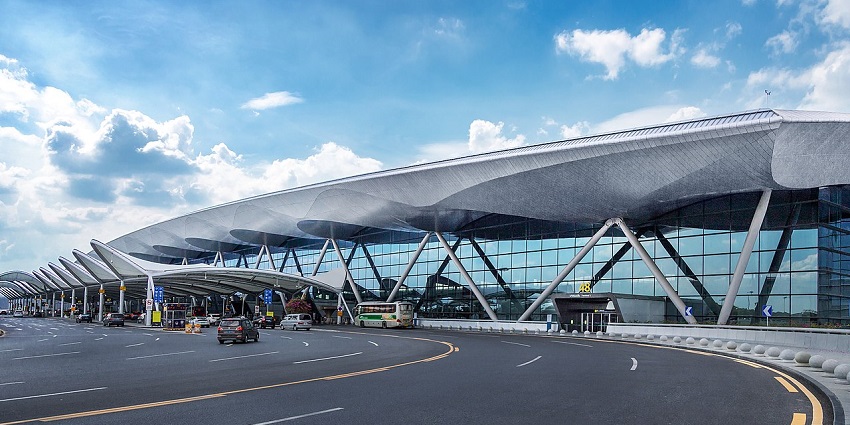 An image of Guangzhou Baiyun International Airport in Asia, featuring Terminal 2 with a modern design