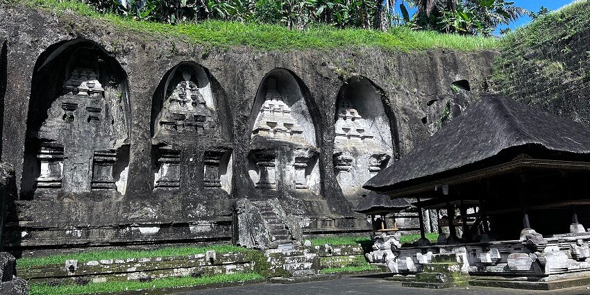 Explore ancient rock-cut shrines surrounded by lush greenery at Gunung Kawi Temple.