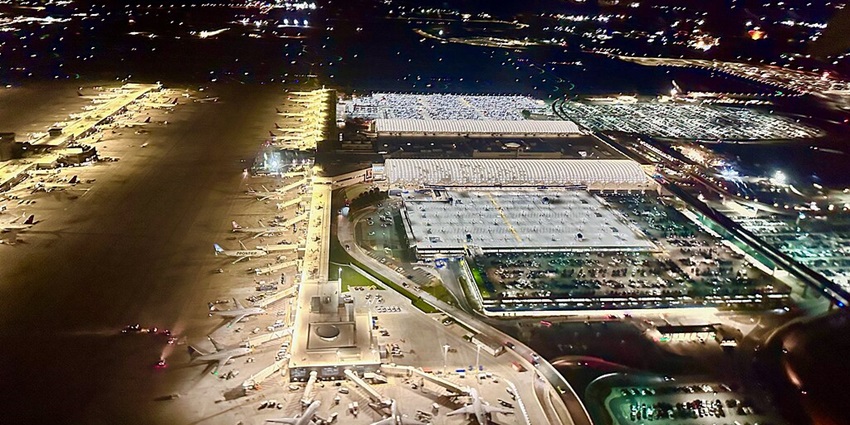 Aerial view of Hartsfield-Jackson Atlanta Airport showing runways, terminals, and flights
