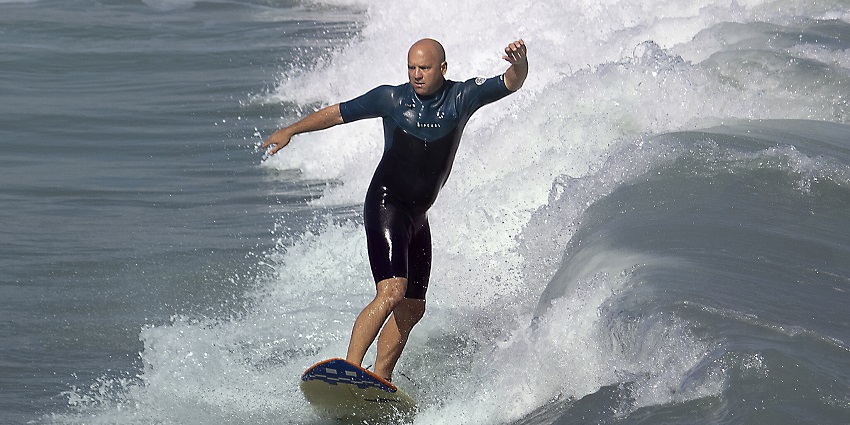 Ride the waves at Kuda Huraa, a premier surfing destination in the Maldives.