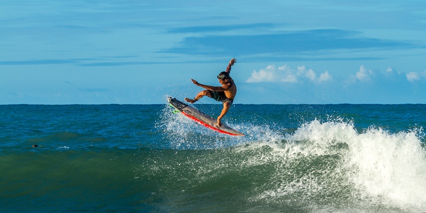 Ride the waves and learn to surf in Bali’s top surfing spots.