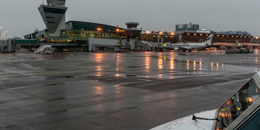 An image of the Helsinki-Vantaa Airport Terminal 2 and the control tower seen from the apron