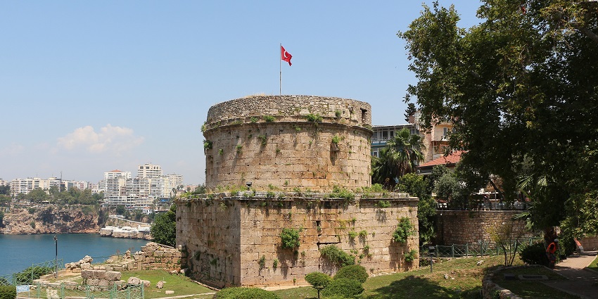 A picture of the Hidirlik Tower overlooking the Mediterranean Sea.