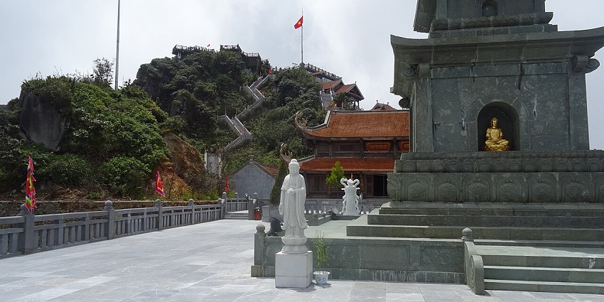 Trekkers walking on the mountainous trails of Fansipan Mountain