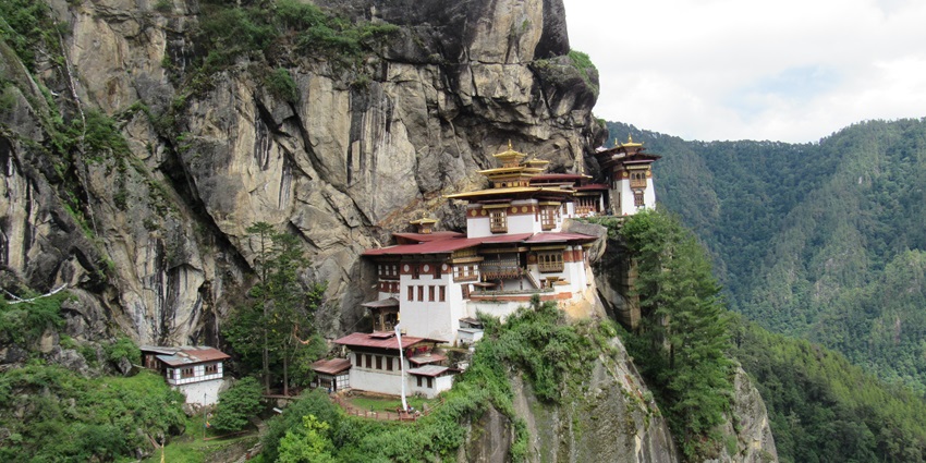 A distant view of a historical monastery, hiking to which is one of the best things to do in Paro