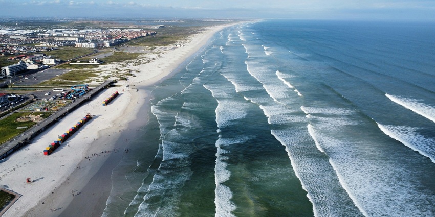 Muizenberg Beach Cape Town, showing its beautiful coastline and early settlement area.
