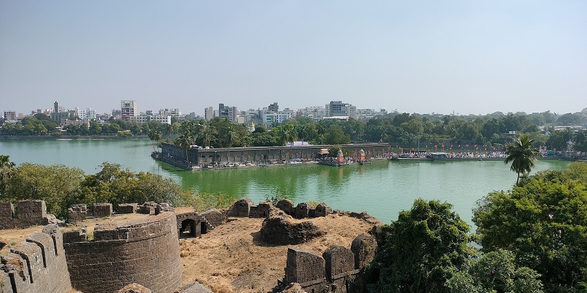 An image of Siddheshwar Mandir viewed from Solapur Fort, showing the temple and its surroundings.