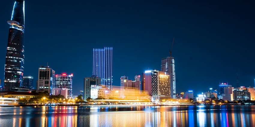 An image showing a view of Ho Chi Minh City, with the views of the illuminated buildings.