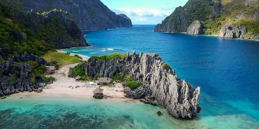 Picturesque view of Hog Island, surrounded by rocky terrains and greenery.