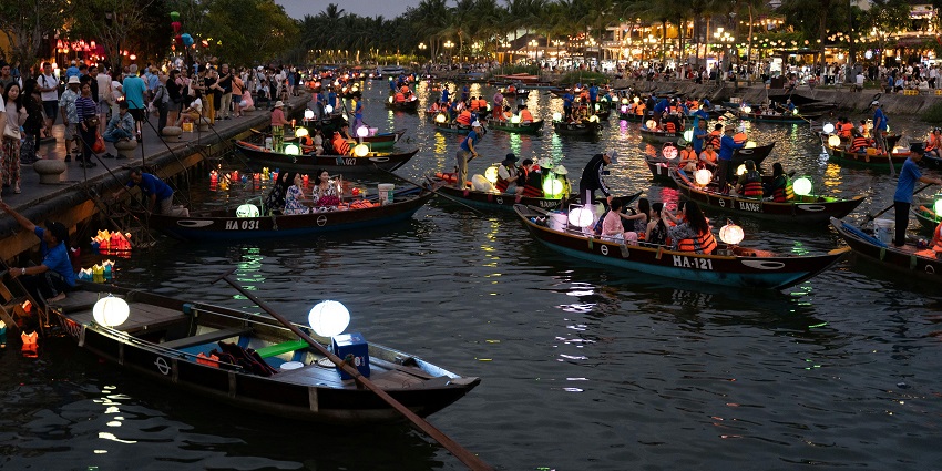 Crowd in boats enjoy Hoi An’s lanterns, a highlight among places to visit in Asia in March