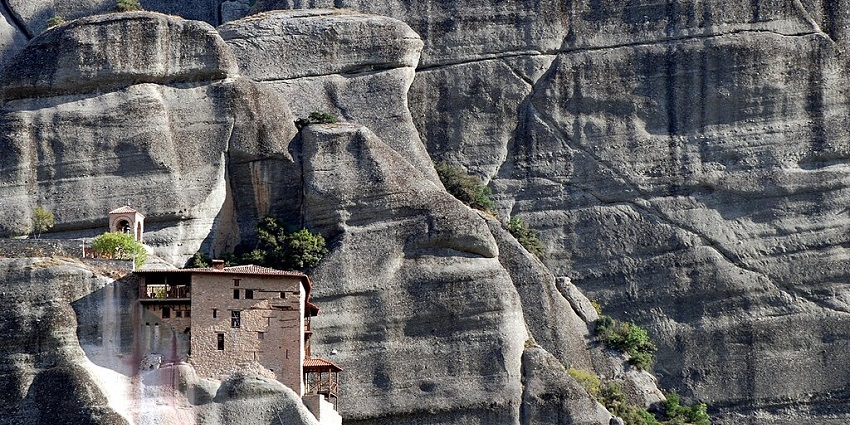 A Meteora monastery in Greece, known for its striking clifftop location.