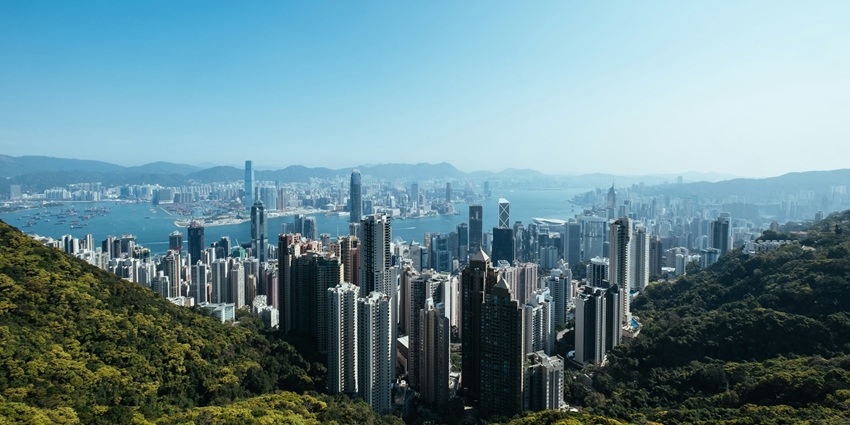 Places to visit in July in Asia include a dynamic city blending skyscrapers, street markets, and lush mountains for breathtaking views
