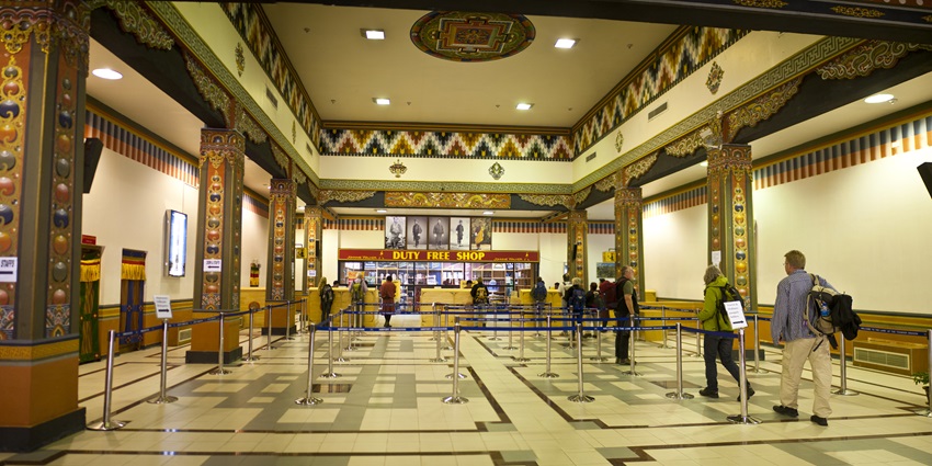 Paro International Airport in Bhutan, with stunning mountain views and traditional architecture.