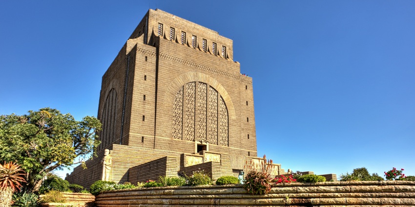 An image showing the architectural details of the Voortrekker Monument’s side view.