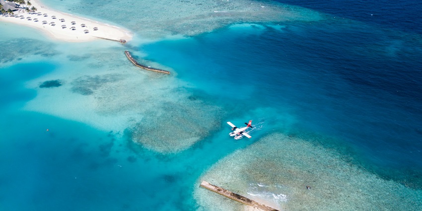 Velana International Airport, the main gateway to the Maldives, offers scenic island arrivals and departures.