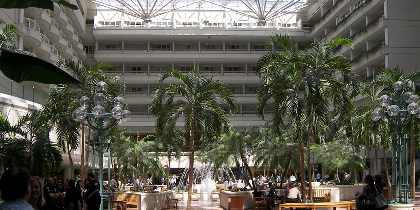 Orlando International Airport Intermodal Terminal with modern design, connecting trains, buses, and flights.