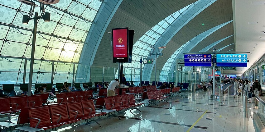 Travellers at the terminal of Dubai International Airport.