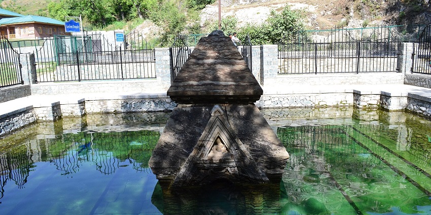 A view of the Manasbal Lake, with picturesque valleys in the background.