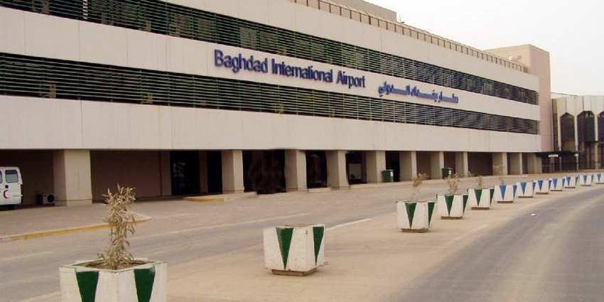 The Baghdad International Airport terminal building with signage in English and Arabic