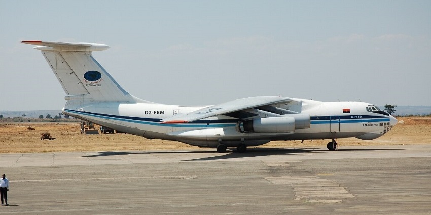 IL76 private jet on a runway with two blue stripes at one of the airports in Angola.