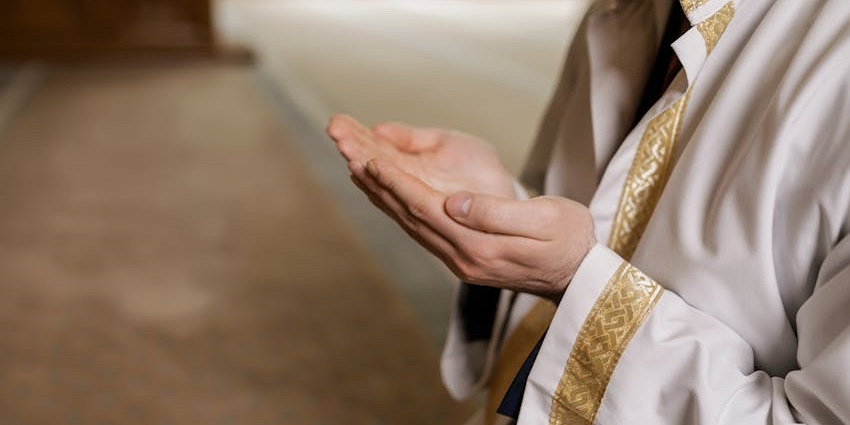 An image of a man bowing in Hue Indian Mosque, a popular mosque in Vietnam