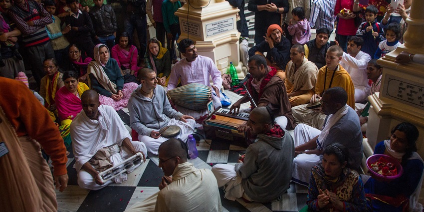 Aarti and Kirtan at an ISKCON Temple in Russia, with devotees engaged in soulful worship.