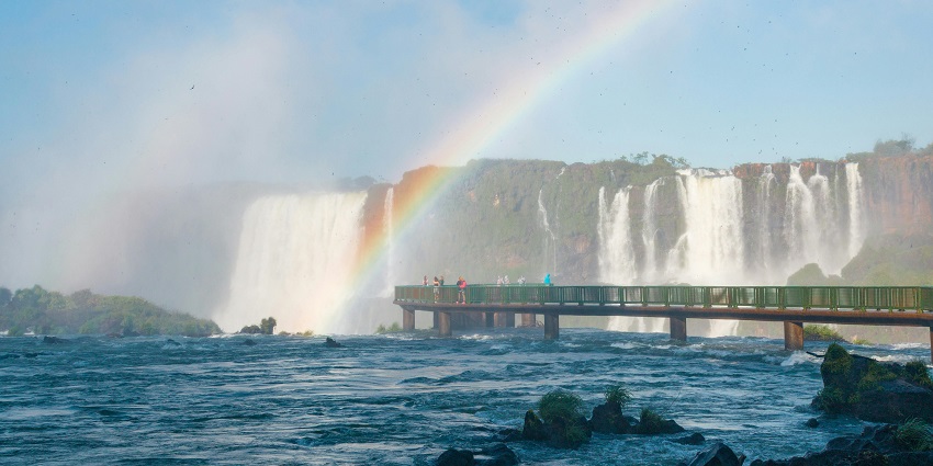 A breathtaking natural spectacle with cascading falls surrounded by vibrant rainforests.