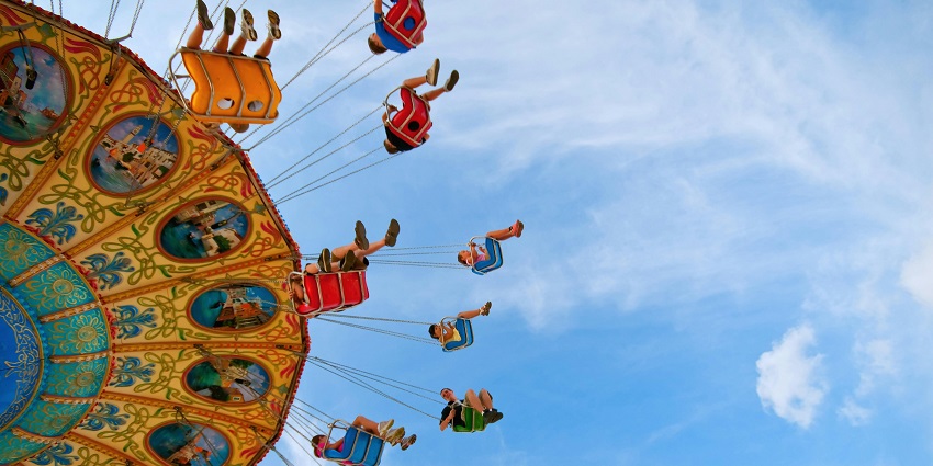 People enjoying a carousel ride at one of the theme parks in Mahabaleshwar, Maharashtra.