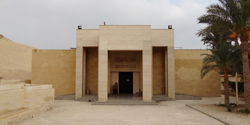 A display inside the Imhotep Museum featuring ancient artifacts and exhibits about Egyptian architecture.