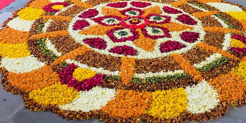 A flower rangoli made by devotees to welcome Gudi inside the house.