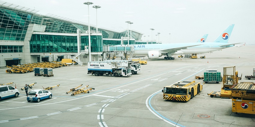 An image of Incheon International Airport in Asia, showcasing a modern departure gate access area