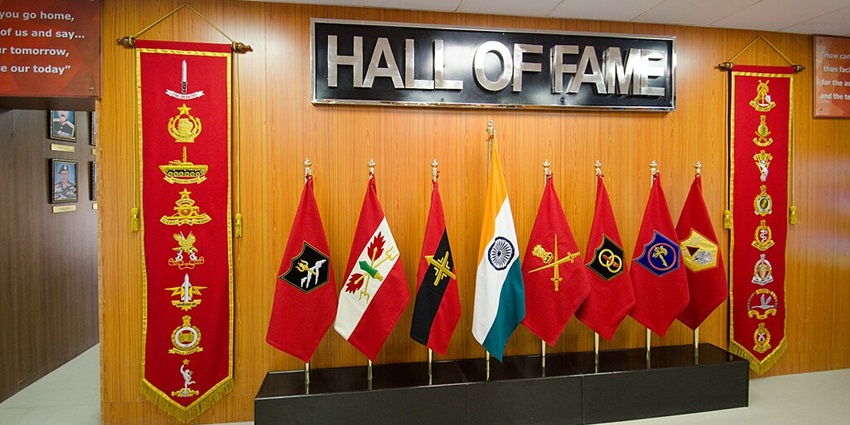 Military uniforms and weapons are displayed at the Indian Army Infantry Museum.