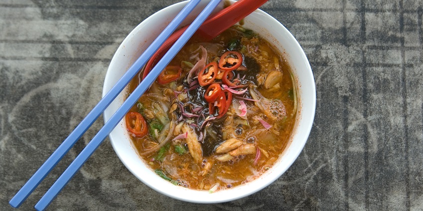 Try the local cuisine at Penang International Airport