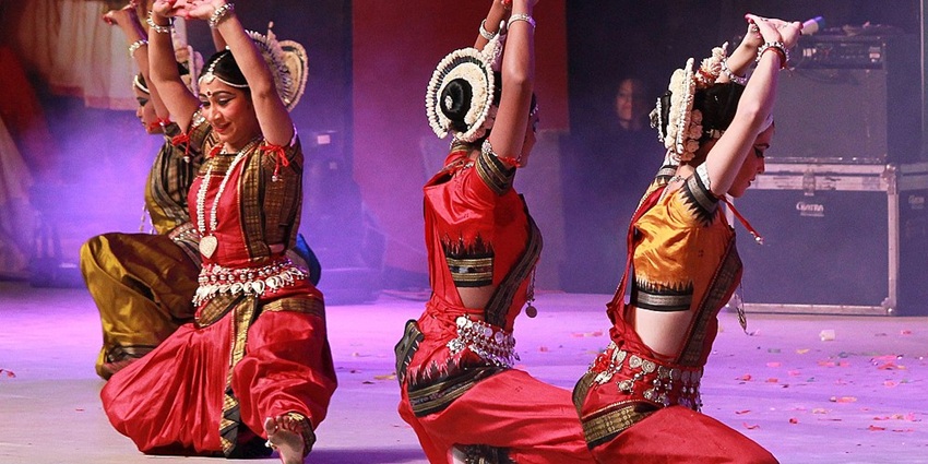 An image of the Odissi dance performance at the International Odissi Dance Festival