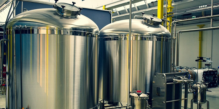 An image showing brewery tanks and fermentation equipment, similar to Inverroche Distillery's.