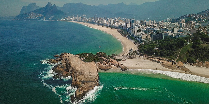 A famous Brazilian beach with golden sand, vibrant culture, and stunning views.