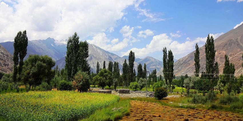 Picturesque view of Ishkoman Valley with tall green trees
