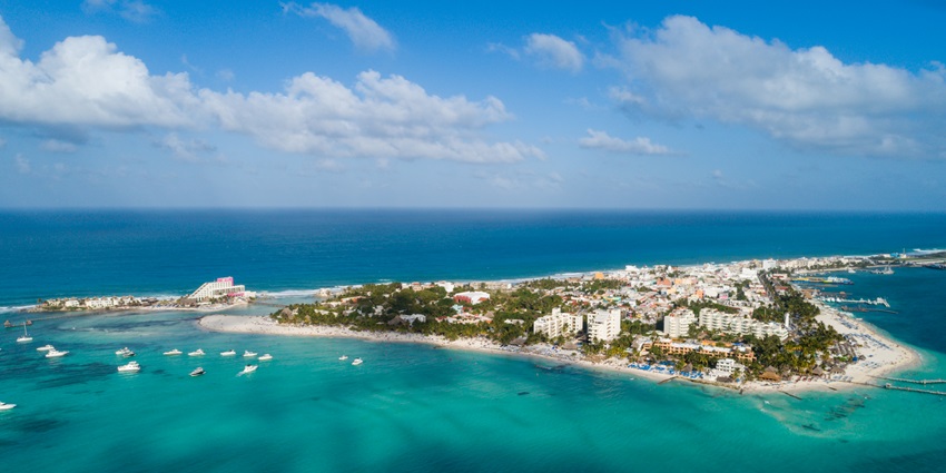 Crystal-clear waters surround Isla Mujeres near Cancun, a scenic spot in the world.