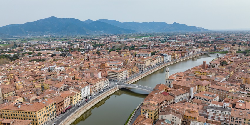 Aerial view of Pisa and the Arno River in Italy, charming stop in any Europe travel guide