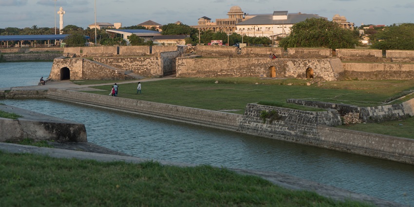 The sturdy stone walls of Jaffna Fort overlook the ocean, showcasing colonial architecture