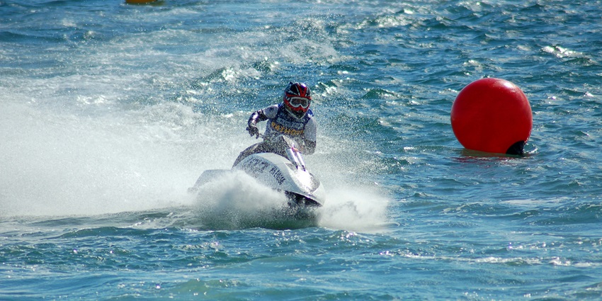 Image of a person participating in a jet ski ride, one of the best water sports in Benoa.