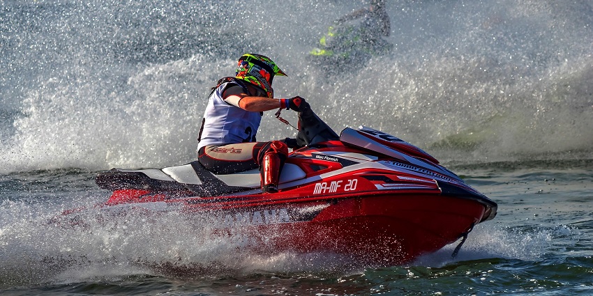 An image of a person doing a jet ski ride, one of the best water sports in Nusa Dua.