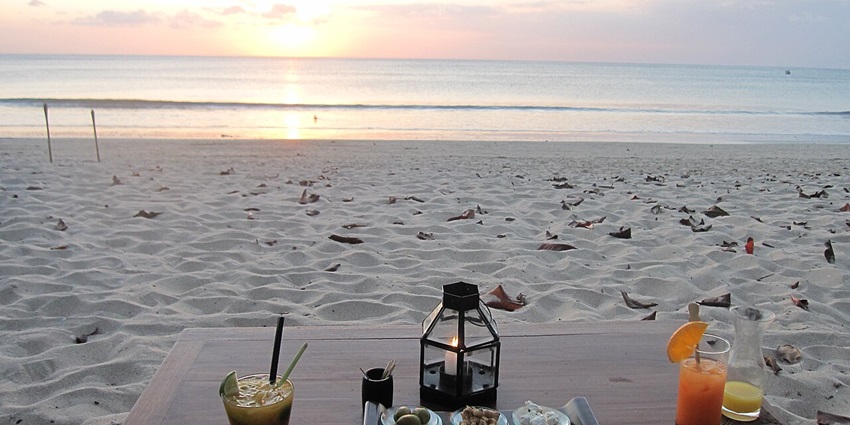 Witness sunset with less crowd and stunning ocean views at Jimbaran Beach, Bali