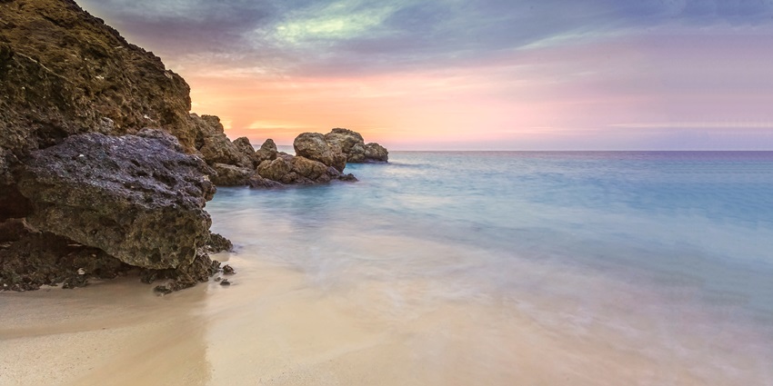 A mesmerising view of a calm ocean during sunset, a view at the Jizan Beaches.