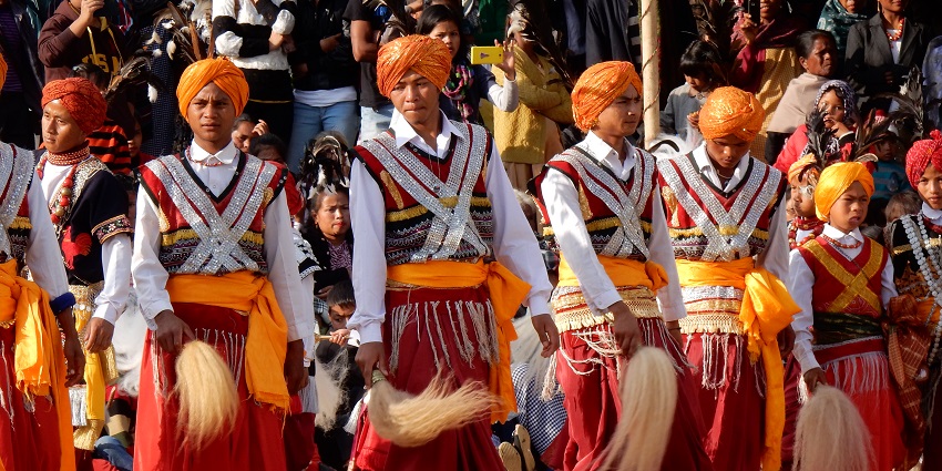 An image showing performers in traditional attire during the Nongkrem Dance in Meghalaya.