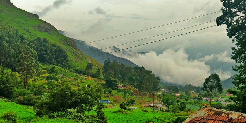 An image showing the Kalrayan Hills with rugged terrain and densely forested slopes.