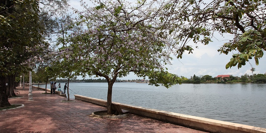 image of a riverside street, one of the beautiful places to visit in Kampot, Cambodia.