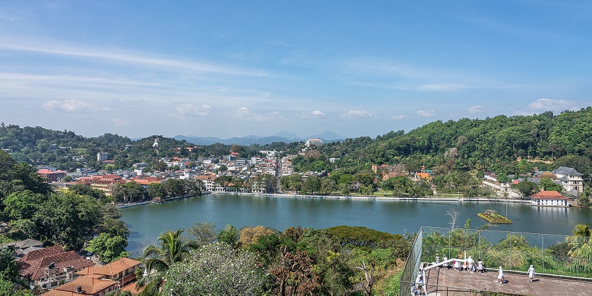 Image of a serene view from Arthur's Seat viewpoint under a blue sky in Kandy, Sri Lanka