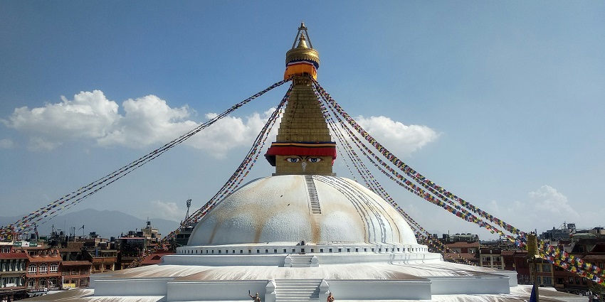 A cultural hub filled with ancient temples, vibrant markets, and Himalayan vistas