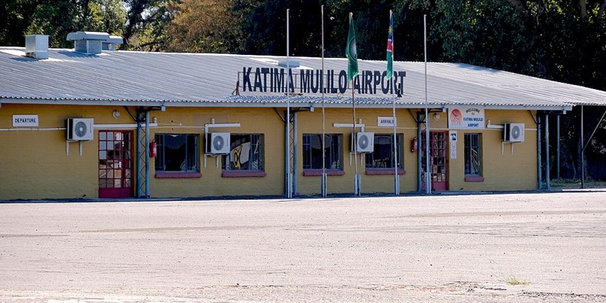 Katima Mulilo Airport’s terminal stands under a cloudy sky in the afternoon.